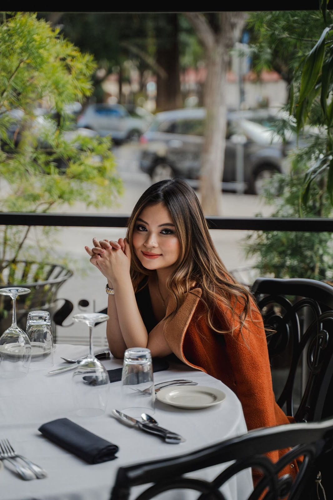A person sitting at a tableAI-generated content may be incorrect.
