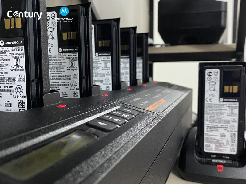 A black rectangular device with several batteriesAI-generated content may be incorrect.